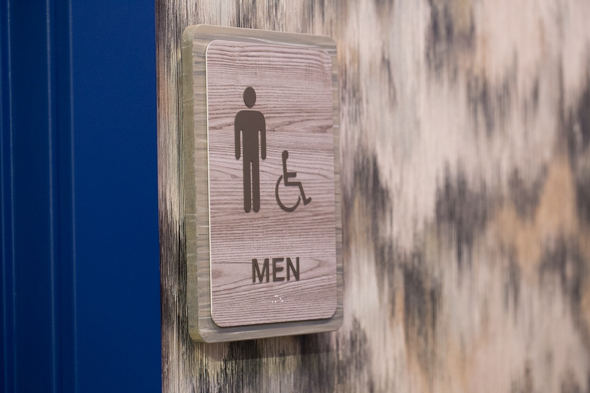 all gender commercial restroom sign